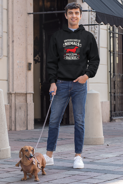 Unterschätze niemals einen Mann mit einem Dackel Premium Herren Hoodie