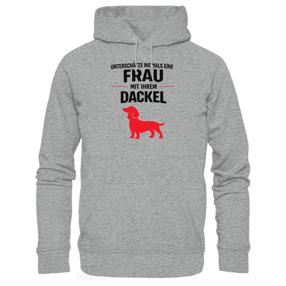 Unterschätze niemals eine Frau mit ihrem Dackel Premium Unisex Hoodie